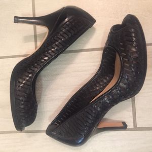 Cole Haan black woven leather pumps